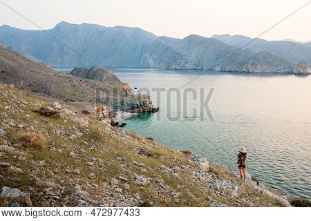 Tourist Woman Stand Enjoy Panorama On Viewpoint In Persian Gulf Mirellas Island. Musandam.oman