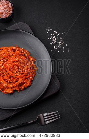 Dried Squid Chopped Into Slices And Seasoned With Sesame Seeds And Spices