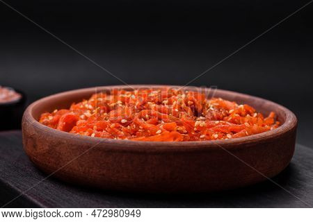 Dried Squid Chopped Into Slices And Seasoned With Sesame Seeds And Spices