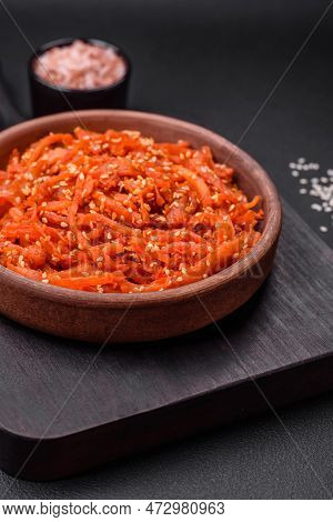 Dried Squid Chopped Into Slices And Seasoned With Sesame Seeds And Spices