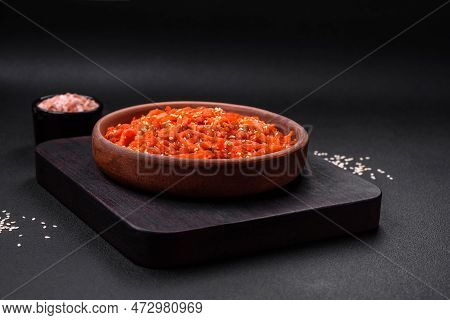 Dried Squid Chopped Into Slices And Seasoned With Sesame Seeds And Spices