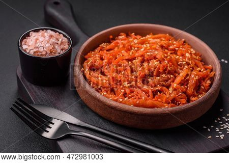 Dried Squid Chopped Into Slices And Seasoned With Sesame Seeds And Spices