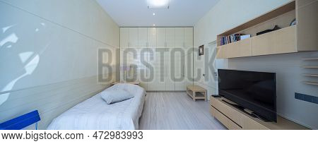 Modern Scandic Interior In Beige Tones Of Bedroom In Luxury Apartment.