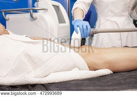 Coolsculpting Procedure In Cosmetology Clinic, Doctor Cosmetologist Makes Procedure For Removing Fat