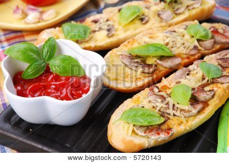 Baquette arrosto con formaggio e funghi