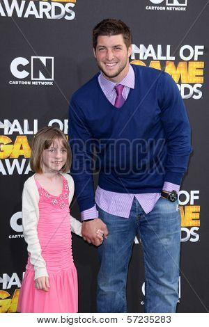 Tim Tebow, Presley Collins at the Cartoon Network Hall of Game Awards, Barker Hangar, Santa Monica, CA 02-18-12