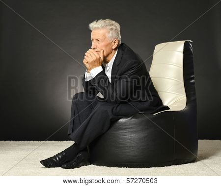 Thoughtful senior businessman
