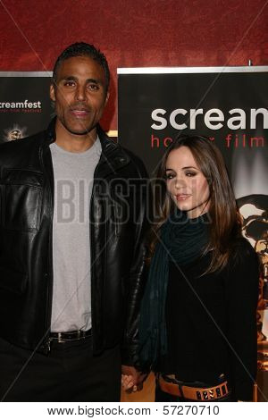 Rick Fox and Eliza Dushku  at a screening of 