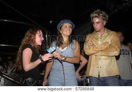 Scarlett Pomers, Mindy Burbano and Wade Robson at Club One Seven, Scarlett Pomers performs, Hollywood and Highland, Hollywood, CA 08-09-02