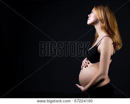 Pregnant woman in underwear