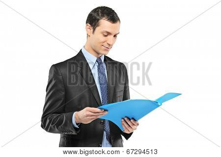 Businessman reading a document isolated on white background