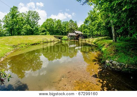 Historic Edwin B. Mabry Grist Mill (mabry Mill) In Rural Virginia On Blue Ridge Parkway And Reflecti