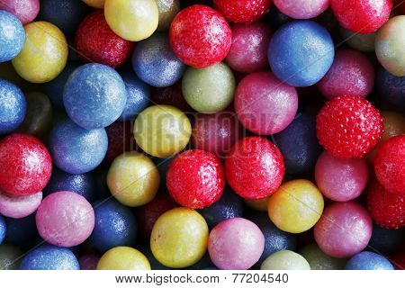 Colorful sweet sugar pearls. Candy, cakes, cookies eatable decoration. Extreme close-up background, pattern.