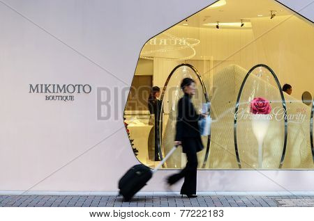 Tokyo, Japan - November 26, 2013: People Shopping At Modern Building In Ginza Area