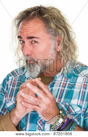 Scheming Man Rubbing Fingers