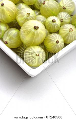Close up of goosberries on white background