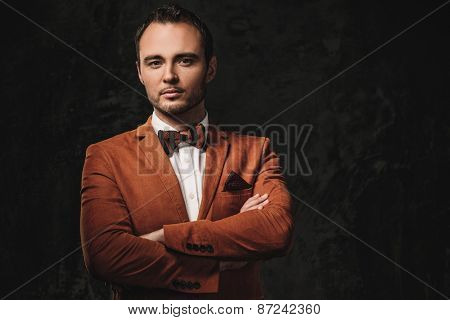 Sharp dressed fashionist wearing jacket and bow tie