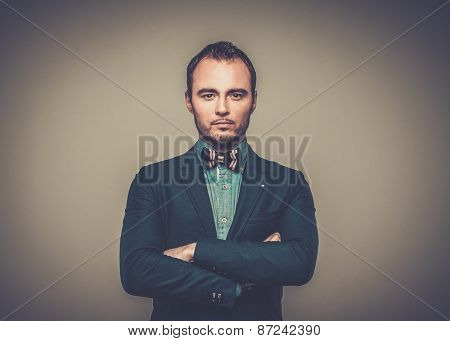 Sharp dressed fashionist wearing jacket and bow tie