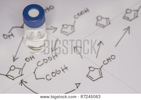 Sample Vial On The Paper