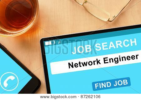 Tablet with Network Engineer on job search site.
