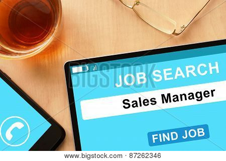 Tablet with Sales Manager on job search site.