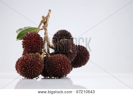 pulasan  thick skin or wild rambutan on the white background