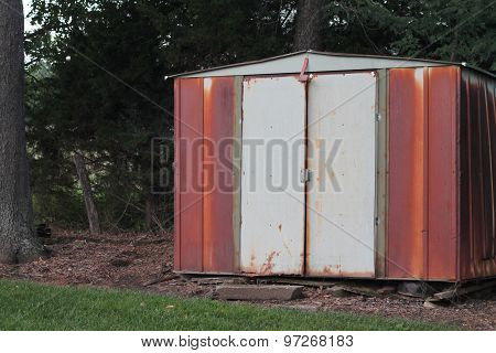 Rusted metal shed