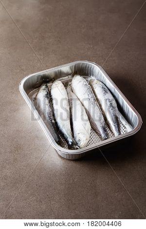Frozen Sardines. Cornish. For Grill And Bbg. Dark Background.