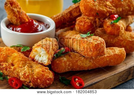 Crispy Halloumi cheese sticks Fries with Chili sauce for dipping