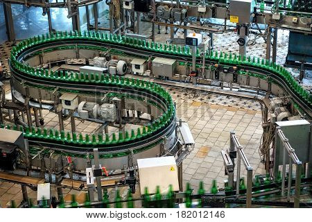 Ceske Budejovice, Czech Republic - June 30, 2016: Budvar Budweiser brewery. Bottle sorting washing and beer bottling workshop with assembly-lines.