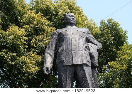 SHANGHAI - FEBRUARY 29. Statue of Chen Yi, first mayor of Shanghai on the Bund in Shanghai. This 5.6m high bronze sculpture was erected at 1993 in Shanghai, China, February 29, 2016.