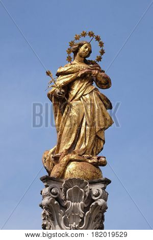 MARIBOR, SLOVENIA - APRIL 03: Virgin Mary statue, Plague column at Main Square of the city of Maribor in Slovenia, Europe. Historical religious sculpture, April 03, 2016.