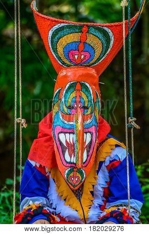 Kid dancers with ghost mask to show in Thai northeastern traditional Phi Ta Khon ghost Festival
