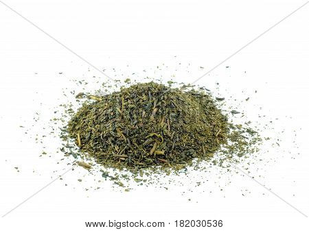 Dry tea leaves on a white background.
