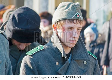 Volgograd Russia - January 30 2011: Portrait of boy dressed as German soldier of World War II in reconstruction of the capture of field Marshal Paulus in Volgograd.