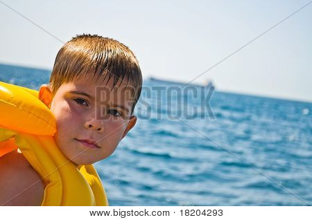 Boy in life jacket