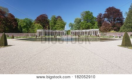 Apeldoorn, The Netherlands - May 8, 2016: Dutch baroque garden of The Loo Palace a former royal palace and now a national museum located in the outskirts of Apeldoorn in the Netherlands