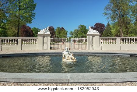 Apeldoorn, The Netherlands - May 8, 2016: Dutch baroque garden of The Loo Palace a former royal palace and now a national museum located in the outskirts of Apeldoorn in the Netherlands