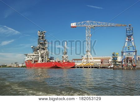 Delfshaven, Netherlands - August 18, 2016: In Delfshaven today can admire the striking pipelay tower of the Seven Sun