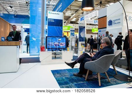Hannover, Germany - March, 2017: Fraunhofer company stand on exhibition fair Cebit 2017 in Hannover Messe, Germany. Fraunhofer researchers in Urban living and Internet of things