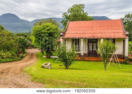 Front Of A Stone House Farm