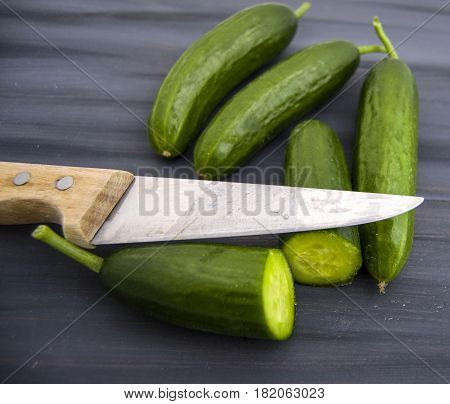 Cucumber, organic natural sailor cucumber pictures, cutting a cucumber with a knife, cucumber pictures on different topics