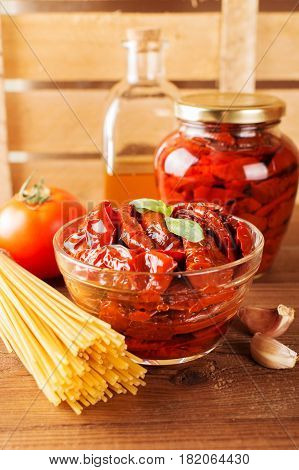 Italian Spaghetti With Ingredients For Cooking Pasta On A Wooden Table