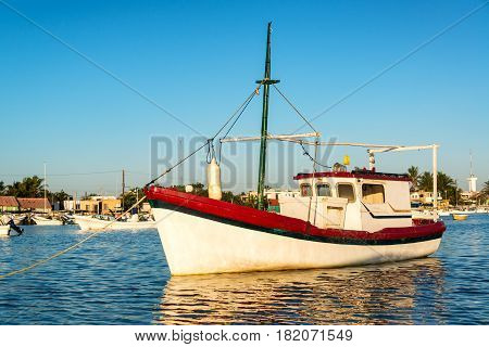 Boat And Reflection In Rio Lagartos
