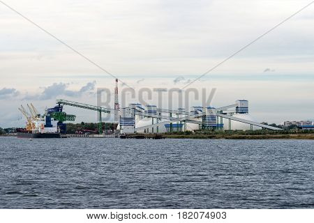 Maritime transportation industry. Mineral transshipment at port.