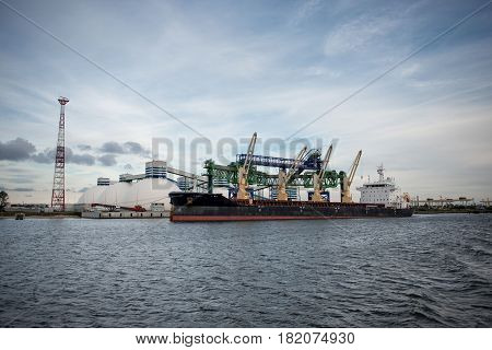 Maritime transportation industry. Mineral transshipment at port.
