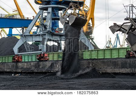 Maritime transportation industry. Work in port coal transshipment terminal.