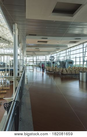 Madrid Spain: 24th July 2016: Passenger waiting for his fly. The Madrid-Barajas Airport is Spain's largest and busiest airport characterised by a floating roof propped by an internal coloured structure.