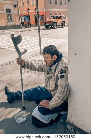 MOSCOW RUSSIAN FEDERATION - APRIL 22: Disabled begging in the city and asks for alms. April 22 2016 Novokuznetskaya street Moscow Russia