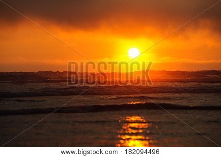 late sunlight into the fog at Kalaloch beach Olympic National Park Washington State